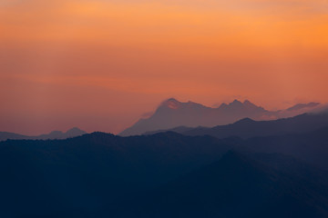 Mountain Mist in sunrise,mist on sunrise,mist over mountain during sunrise.Beautiful landscape in the mountains at sunrise.