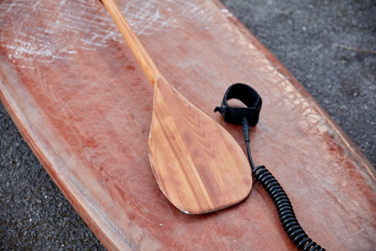 Close up view of paddleboard and oar