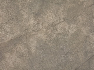 the texture of the stone gray walls