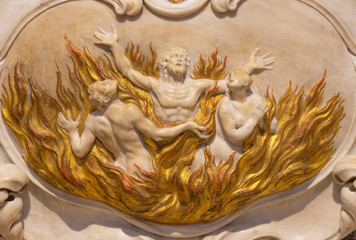 RIVA DEL GARDA, ITALY - JUNE 13, 2019: The baroque marble relief of the souls in purgatory in...
