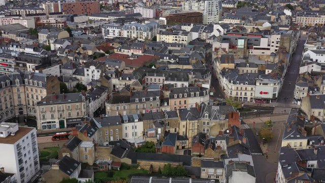 Aerial shot following a tramway urban area avenue g&eacute;n&eacute;ral leclerc le Mans houses France Sarthe
