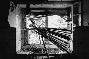 Old broken window on an abandoned old building