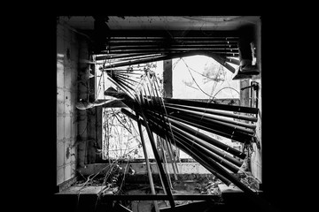 Old broken window on an abandoned old building