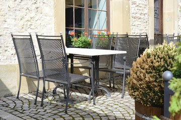 Metal Cafe Table & Chairs on Sunny Veranda