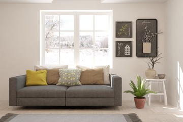 Stylish room in white color with sofa and winter landscape in window. Scandinavian interior design. 3D illustration