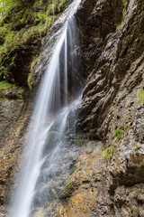 Fototapeta na wymiar Wasserfall am Scharnbach in Weissbach, Berchtesgaden