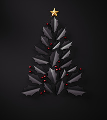 Abstract christmas tree made of black leaves with copy space on dark background