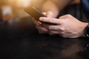 Close up hand of people holding and using smartphone for communication internet business social network concept.