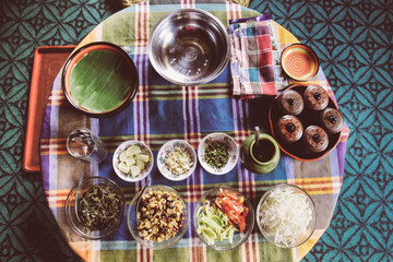 Obraz na płótnie Canvas Ingredients for Myanmar Burmese traditional leaf salad and table set up close up
