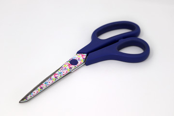 Scissors on a white background