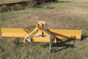 Farm Equipment in a Field