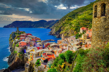 Landscape view of colorful village Vernazza with dramatic sky in Cinque Terre