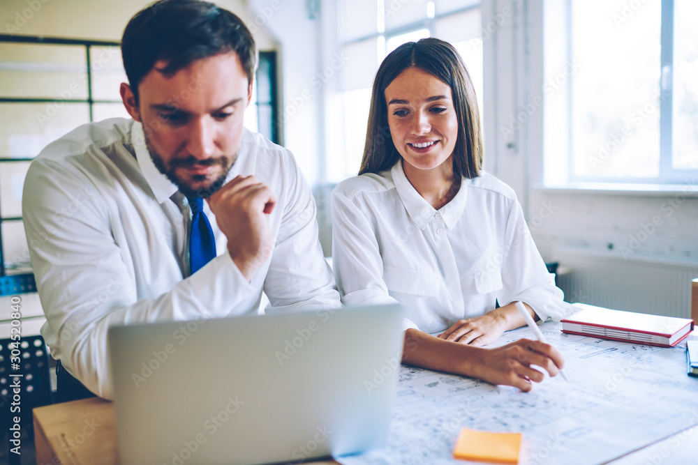 Poster caucasian businessman searching information for startup project via laptop computer while positive f