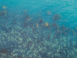 Stony bottom under greenish transparent water. Thailand	