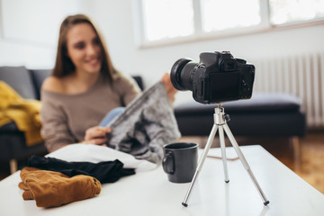 woman vlogger recording her new vlog about fashion