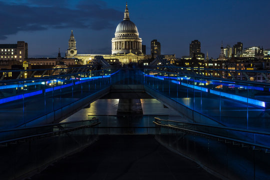 St. Pauls Cathedral And Milenium Bridge At Night.