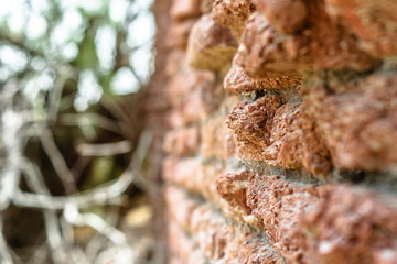 an ancient design of a mosque with tombs on the top of it made by traditional red bricks  