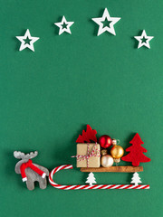 Christmas composition. Gift bauble reindeer pine star top view background with copy space for your text. Flat lay.