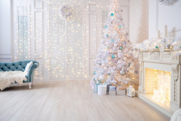 the interior of the living room in bright colors, decorated for Christmas.