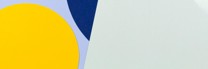 Abstract colored paper texture background. Minimal geometric shapes and lines in pastel blue, light green, navy, yellow colours