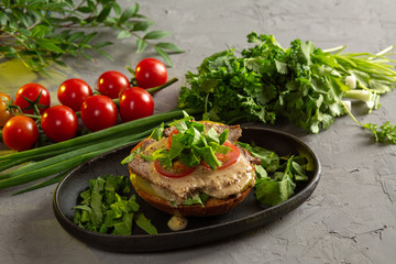 bruschetta with roast beef - baked veal tenderloin with salted cucumber, tomato, spinach and mustard sauce on a warm fried bun