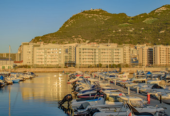 Gibraltar small boat marina with a glowing sunset