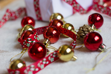 Christmas tree decorations on white wooden background