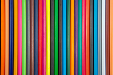 Colored pencils and pen for drawing. Texture and background. Education and creativity. Leisure and art