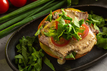 bruschetta with roast beef - baked veal tenderloin with salted cucumber, tomato, spinach and mustard sauce on a warm fried bun