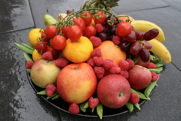 Fruit plate on a black background