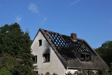 house fire,  burned roof truss, demolotion work, fire damage