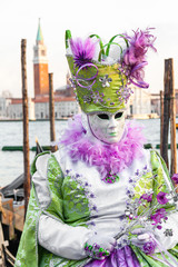 Fototapeta na wymiar Beautiful mask at the famous Venice carnival, Italy