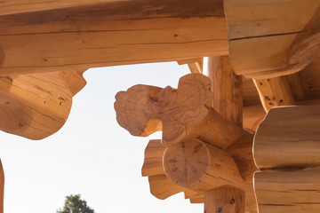 Details and elements of wooden house made of timber. The constru