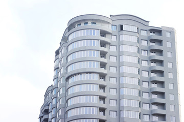 high-rise building with identical balconies, background or texture