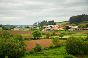 Fototapeta na wymiar Farm town on the Camino de Santiago, the Compostela pilgrimage thru-hike, Galicia, Northern Spain (Spring)