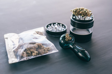 Weed grinder Fresh marihuana. Cannabis legalisation. CBD and THC on buds in cannabis. Cannabis buds...