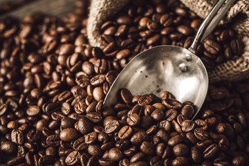 Coffee beans with scoop.