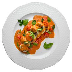 Squid or champignon stuffed with seafood in spicy sauce. Gourmet restaurant menu. Isolated on white background. Flat lay top view