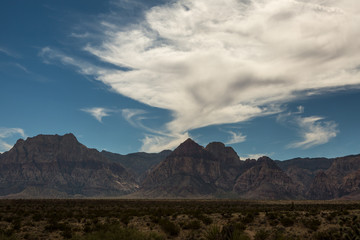 Cloud over mountains at redrock canyon