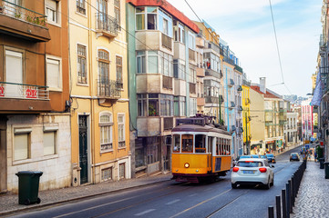 Fototapeta na wymiar yellow tram, Lisbon street, Portugal