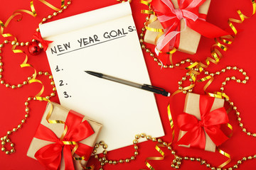 New Year goals plan in a notebook	
