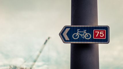 bike sign on lamp post