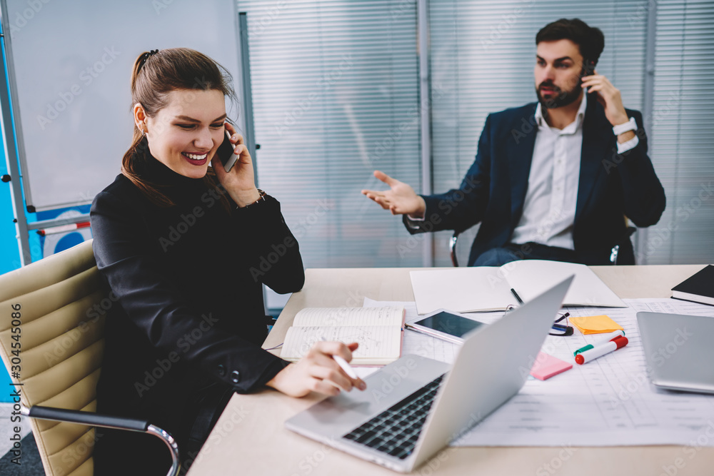 Aufkleber successful female manager checking database on laptop computer and calling to client to discussing p