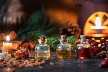 Christmas mix of essential oils with frankincense, myrrh, star anise, pine - obrazy, fototapety, plakaty