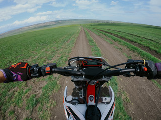 Enduro journey with dirt bike high in the mountains