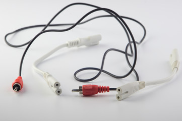  wires and adapters in white and black on a gray background