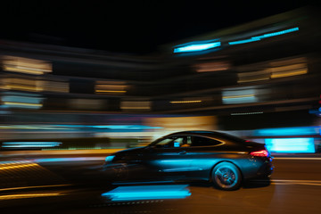 Monaco city night car traffic near Hotels and Casino