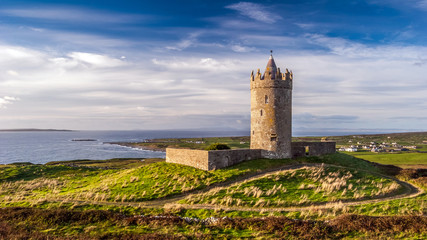 Fototapeta na wymiar Doonagore Castle round tower in County Clare, Ireland