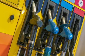 Fuel pumps at a gas station close up