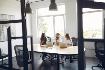 Students create a new project. Team working in a office